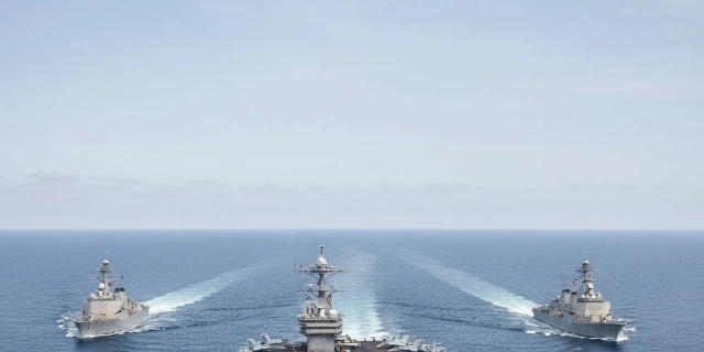 U.S. Aircraft Carrier Enters Middle Eastern Waters as Iran Issues Warnings and Trump Says Tehran Still Wants Talks